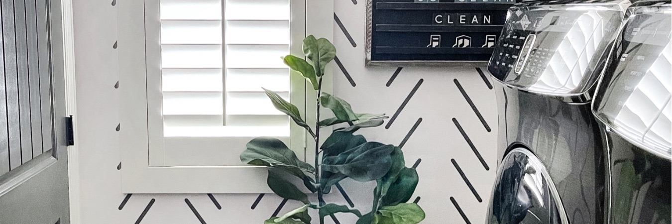 Laundry room with shutters