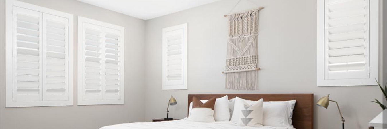 White shutters in a bedroom