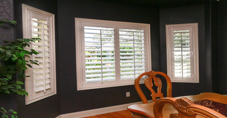 Beautiful Plantation Shutters In Dining Room With Dark Paint