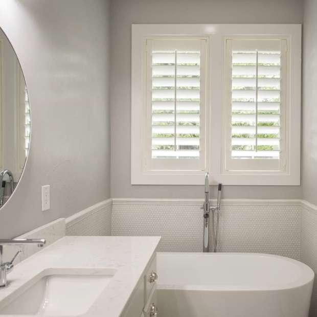 Studio shutters above a bathtub