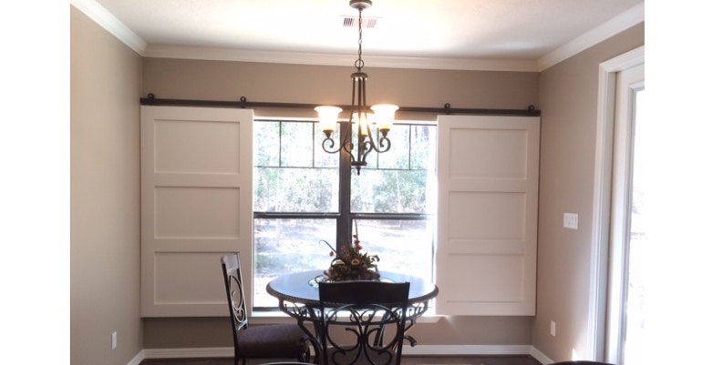 Barn doors open horizontally with slides instead of cords. Southern California barn door shutters