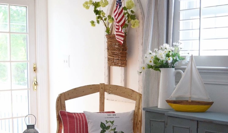 Bright sitting corner with faux wood plantation shutters in Southern California. Faux wood plantation shutters in Southern California