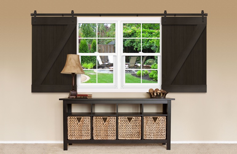 Sliding Barn Doors As A Window Treatment In Southern California Window covered by sliding barn doors